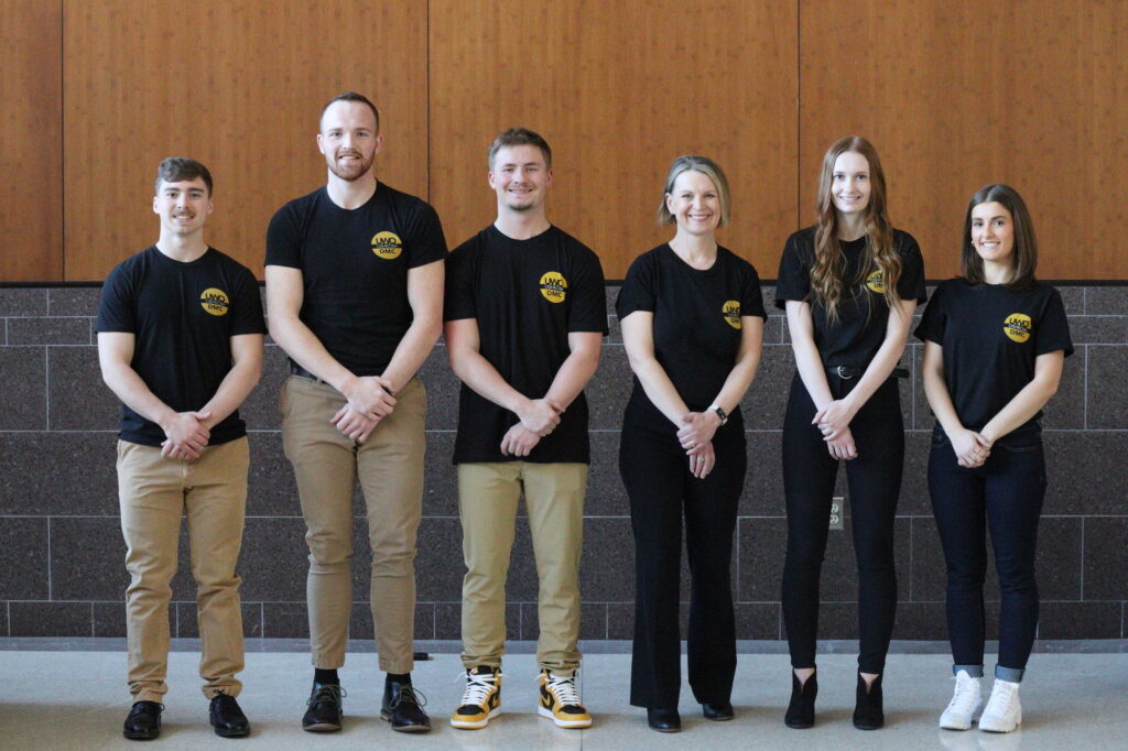 2022 DMC Team - Students with Professor
