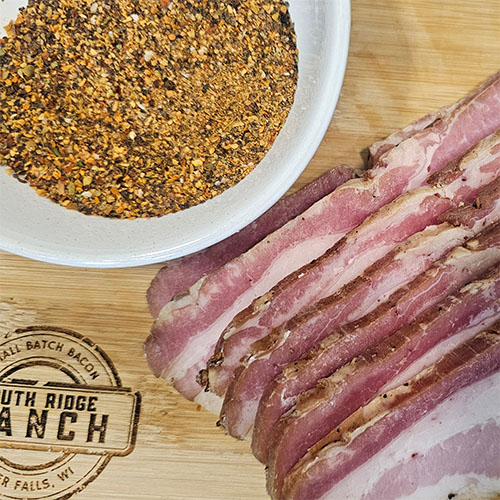 bacon slices on wooden table