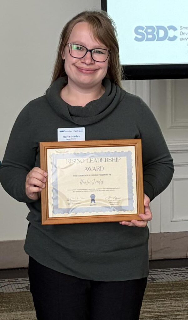 Harlie with award